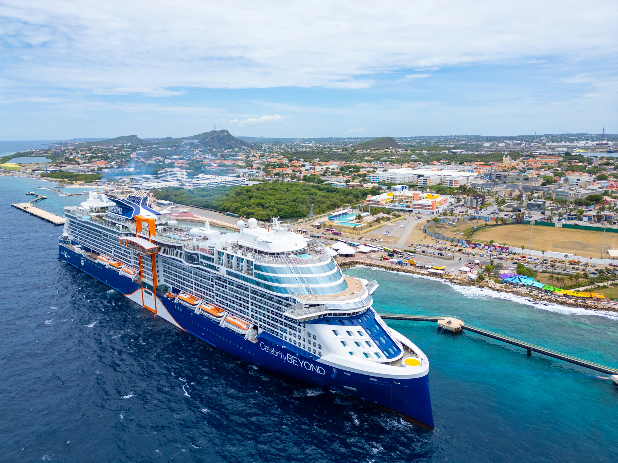 A large cruise ship in the middle of the ocean