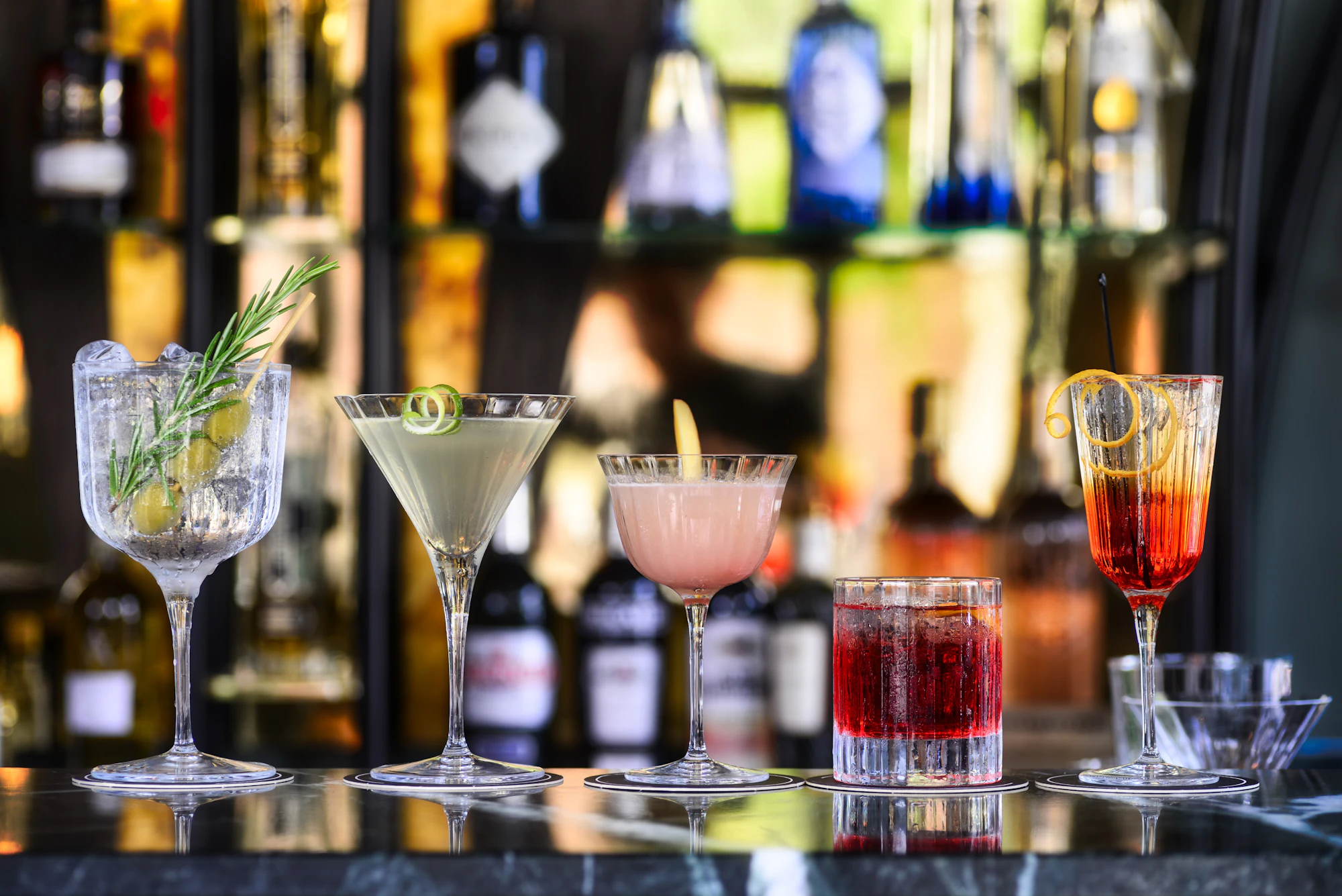 Cocktail glass with pink liquid