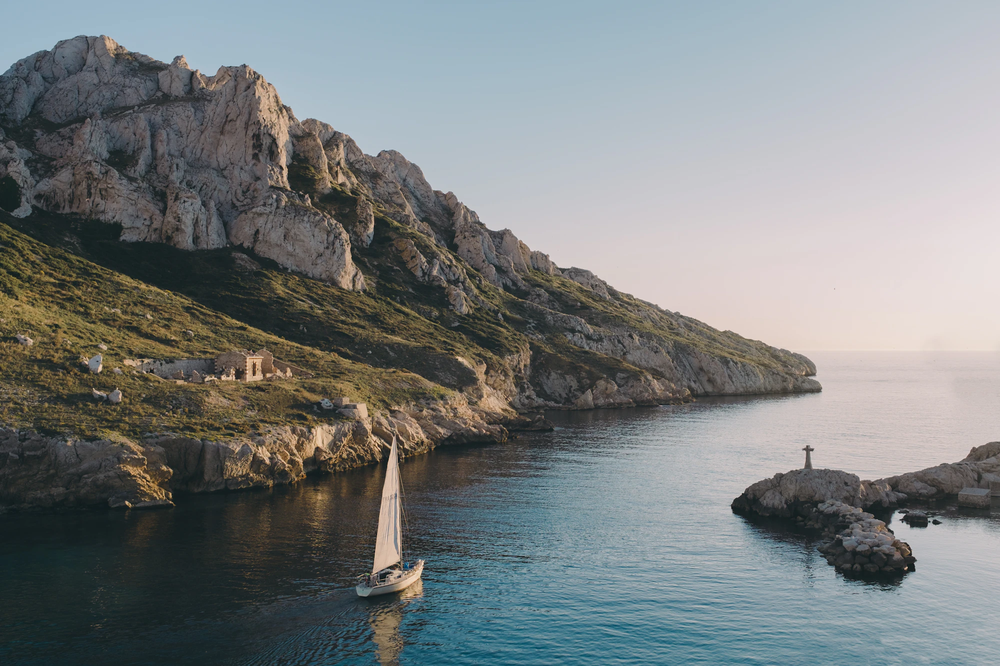 Sailboat near calanques rocks, Marseille