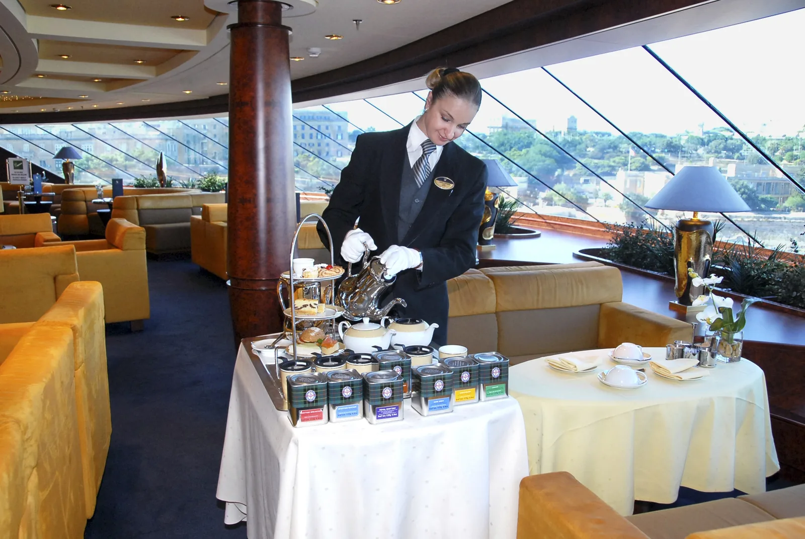 Afternoon tea served in the MSC Yacht Club Top Sail Lounge